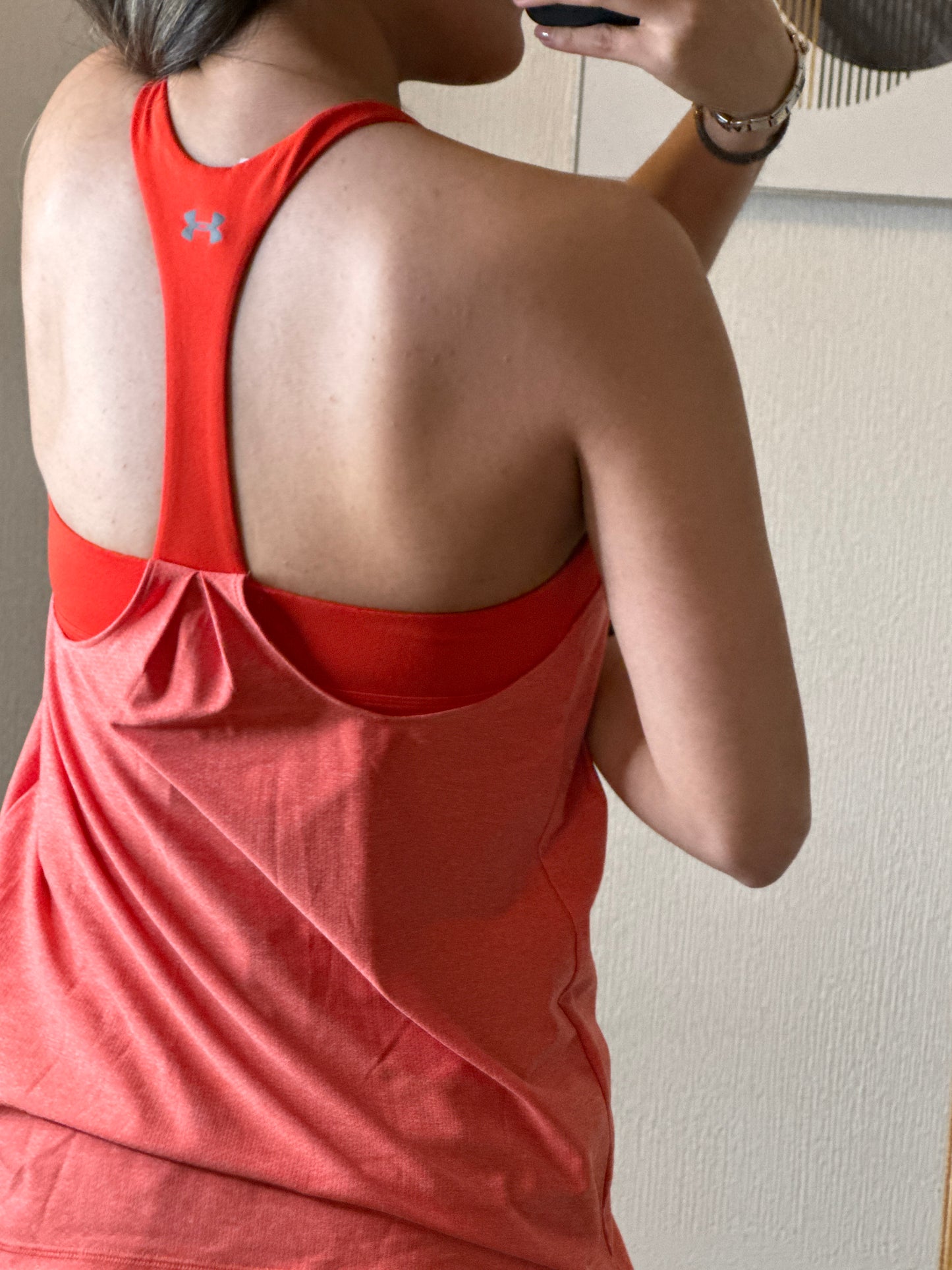 Blusa deportiva naranja UNDERARMOUR